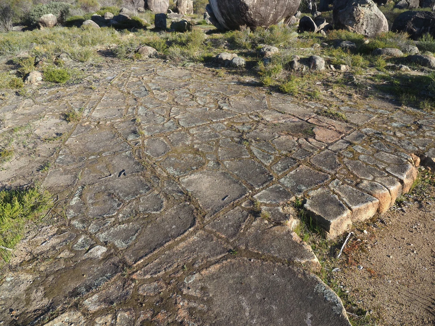 Natural jointing in the granite that looks like a paved / tiled surface